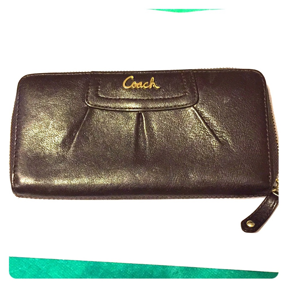 Brown leather coach zip around wallet accordion